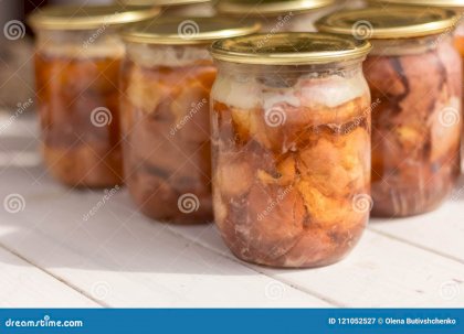 canned-meat-glass-jar-white-wooden-table-glass-jars-canned-meat-white-wooden-table-home-preservation-121052527-115224081.jpg